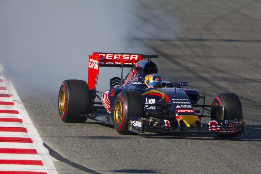 Carlos Sainz in een Toro Rosso Formule 1 auto
