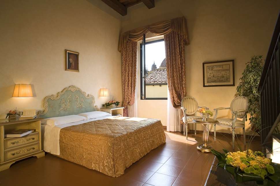 Hotelkamer van Machiavelli Palace in Florence, Italië